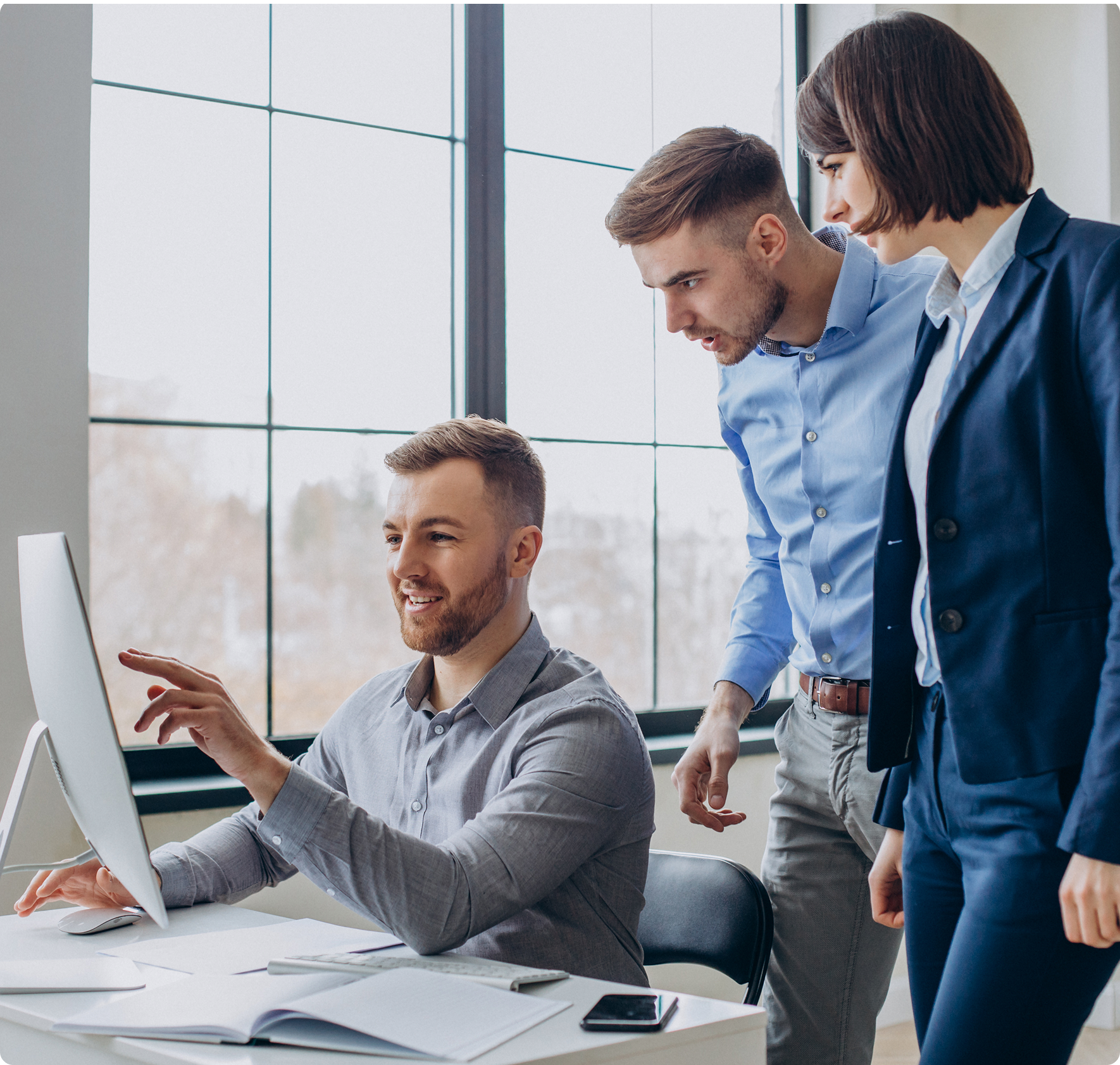 Team collaborating in office environment
